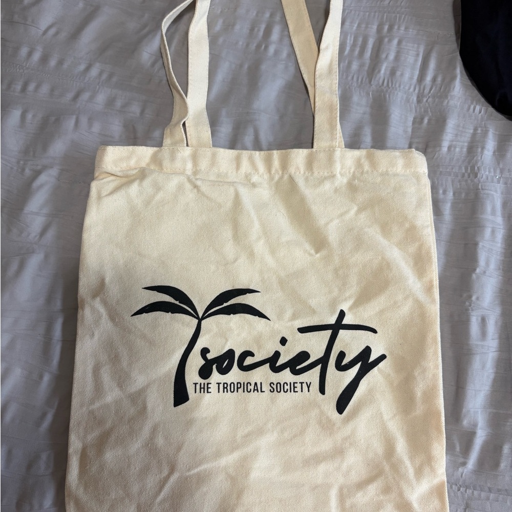 The Tropical Society Canvas Tote Bag in Cream with Black Logo